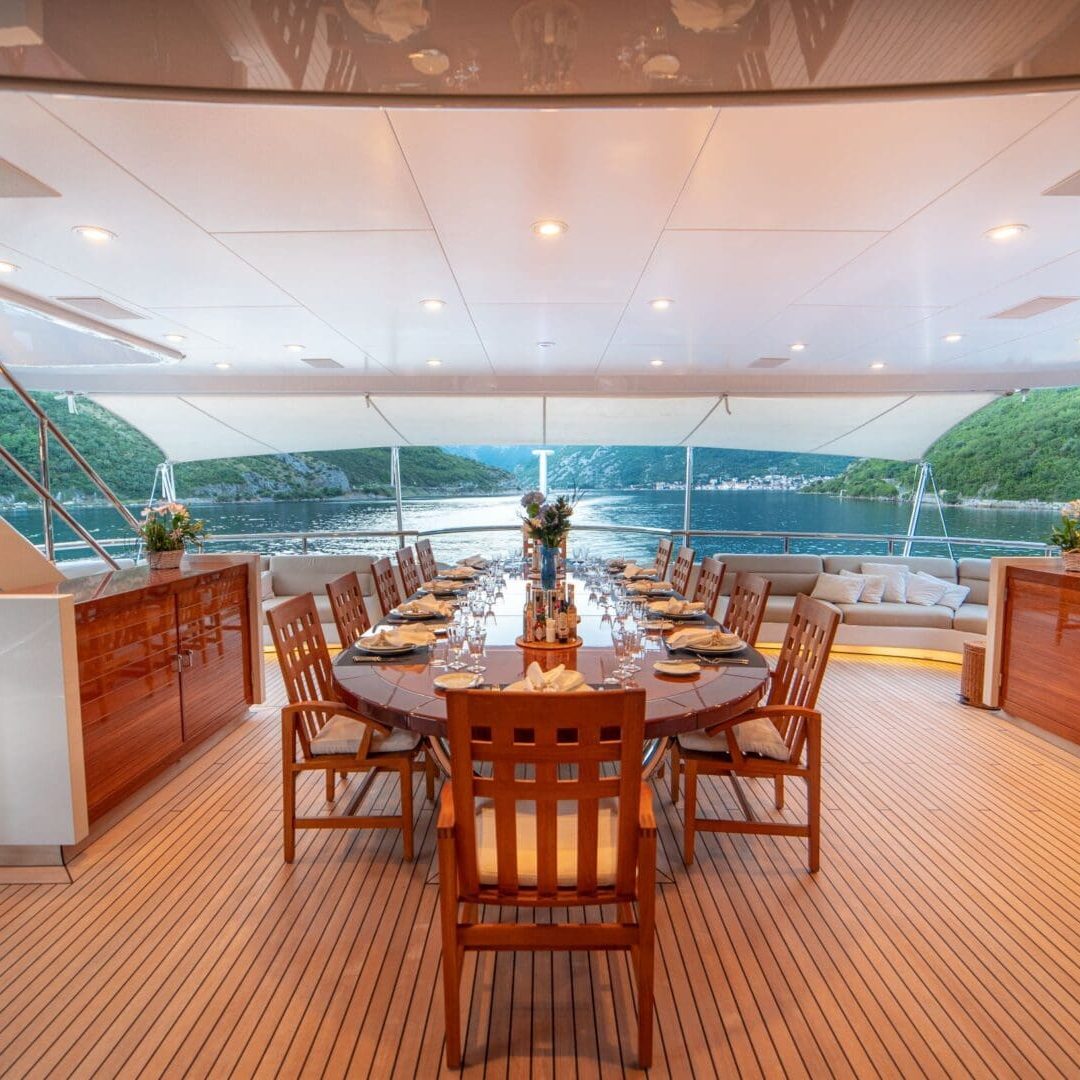 Luxury yacht with elegant dining area.