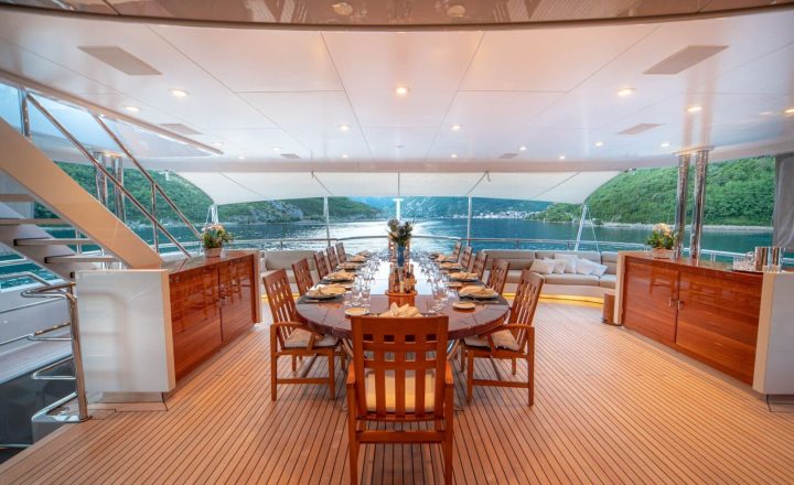 Luxury yacht with elegant dining area.