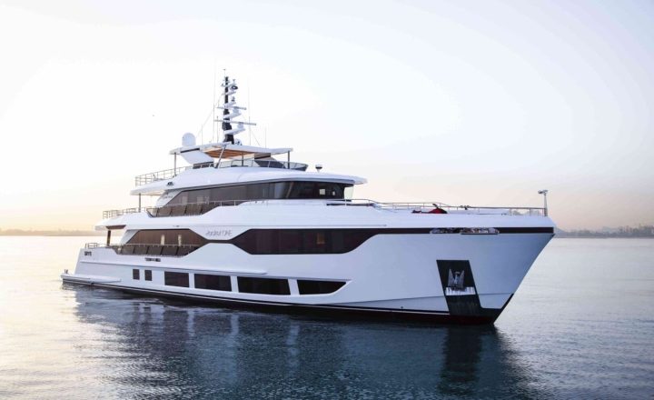 A large white motor yacht on the water.